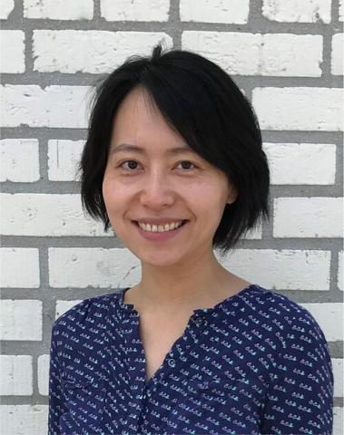 Xinzhu Yu, female with short black hair